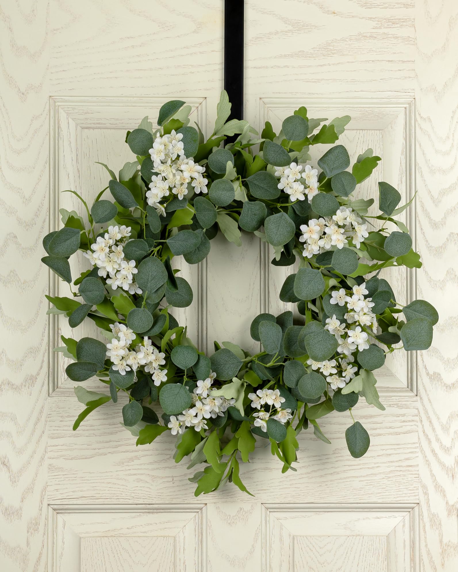 YUGALI eucalyptus and white cherry blossom wreath enhances indoor or outdoor spaces