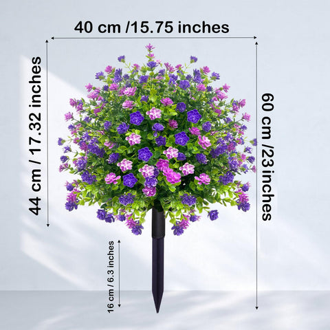 YUGYUM purple blooms and green leaves brighten porch or doorway.