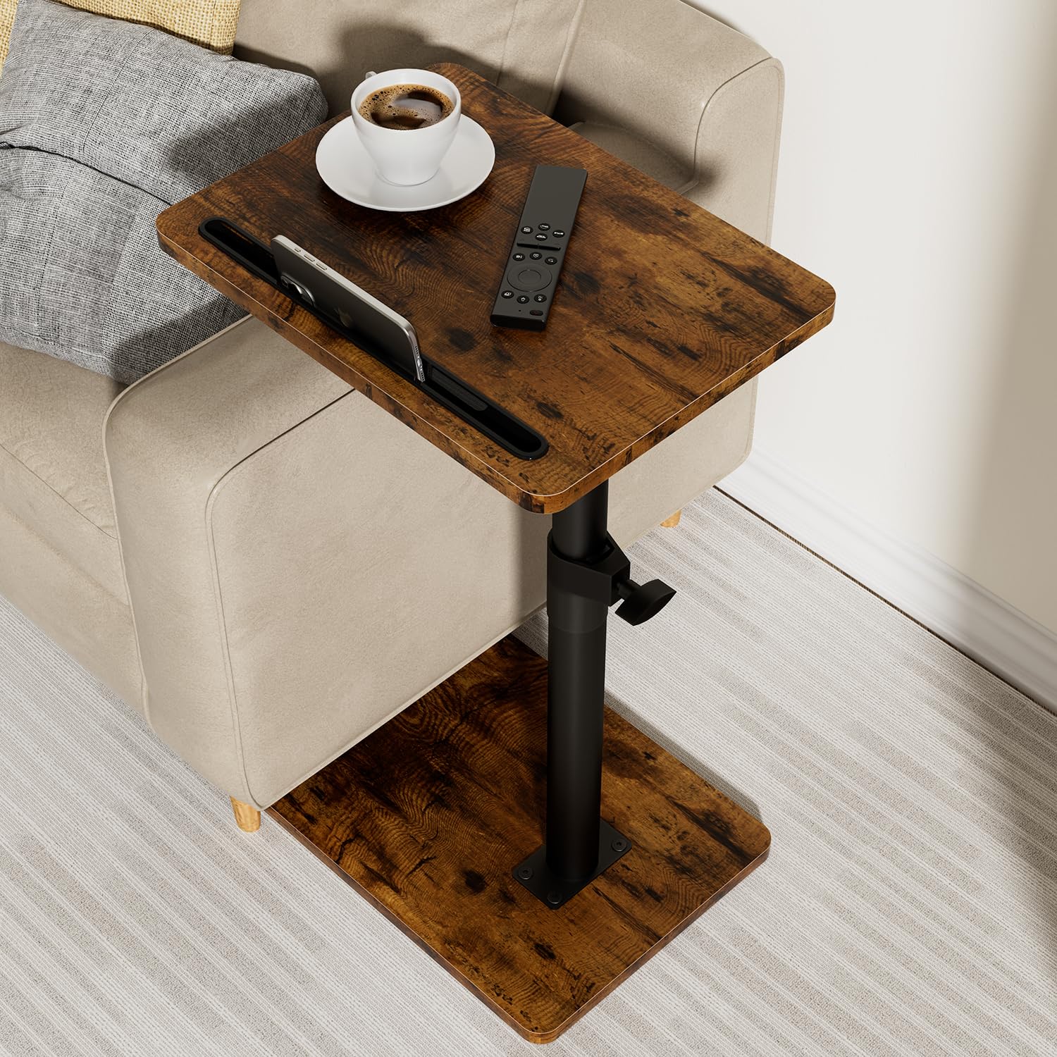 YUHFERA sofa armrest tray table on a couch keeping snacks and devices within easy reach.
