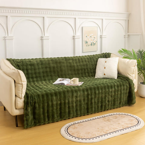 The YUSOKI bubble-pattern blanket styled on a sofa for cozy living room decor.