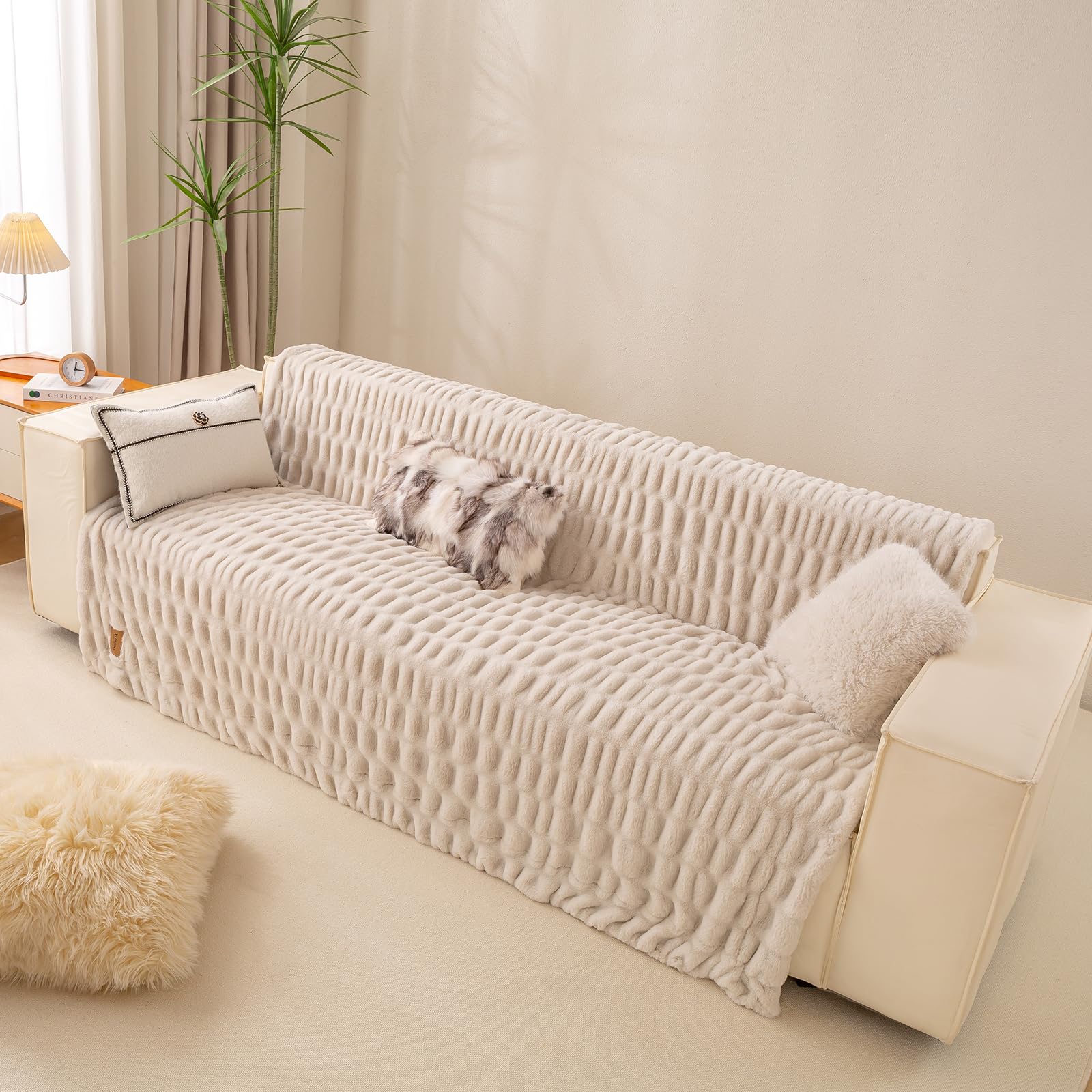 YUSOKI faux fur throw in bedroom decor for spa-like relaxation.