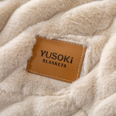 YUSOKI beige antique ivory throw complements seasonal décor nicely.