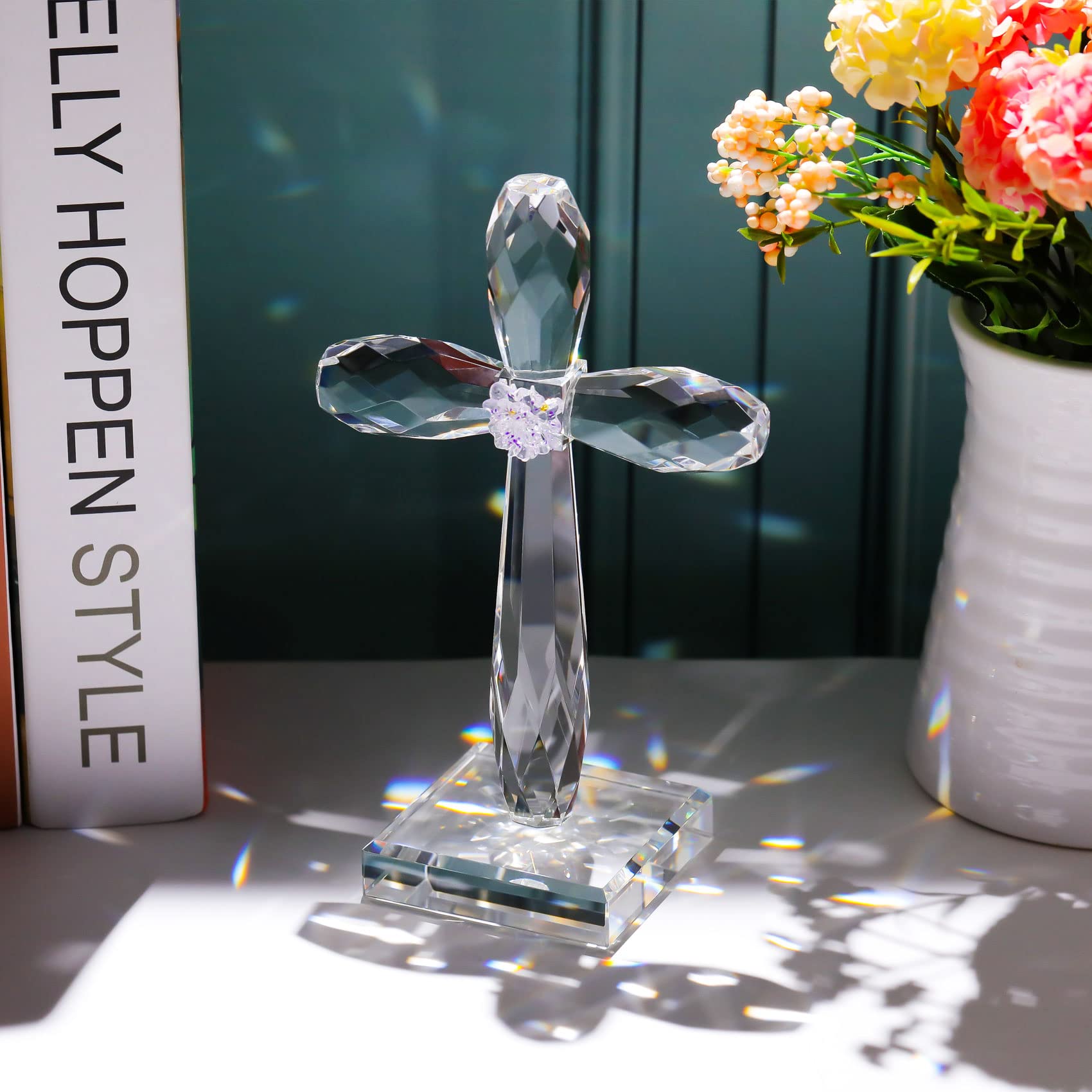 YWHL Crystal Standing Cross Decor bathed in sunlight with rainbows for ambience.