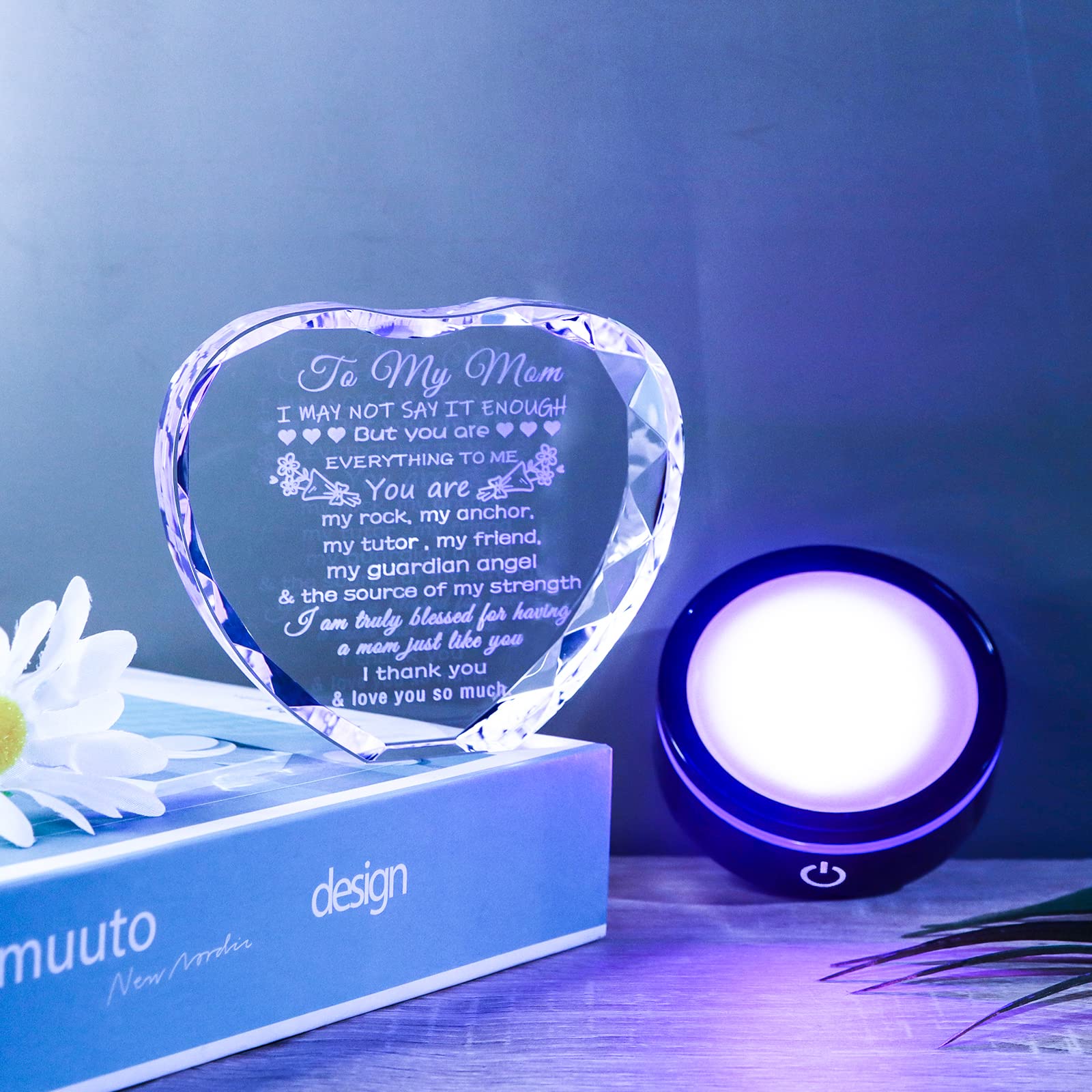 YWHL faceted crystal catches light, creating sparkling reflections