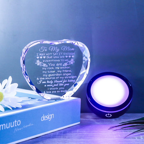 YWHL faceted crystal catches light, creating sparkling reflections