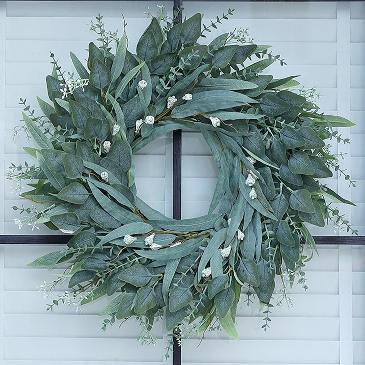 YXZZWL 26-inch eucalyptus wreath on a front door boosts curb appeal.