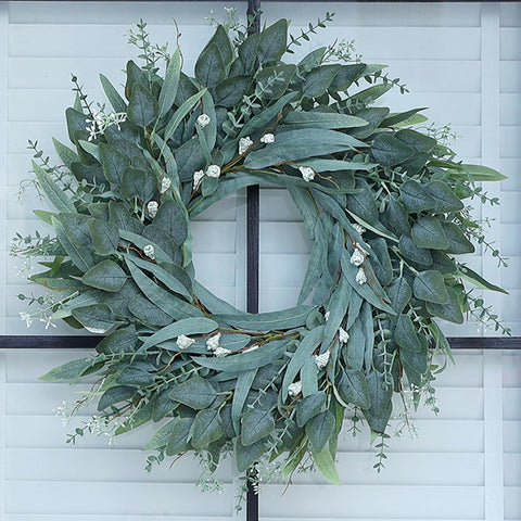 YXZZWL 26-inch eucalyptus wreath on a front door boosts curb appeal.