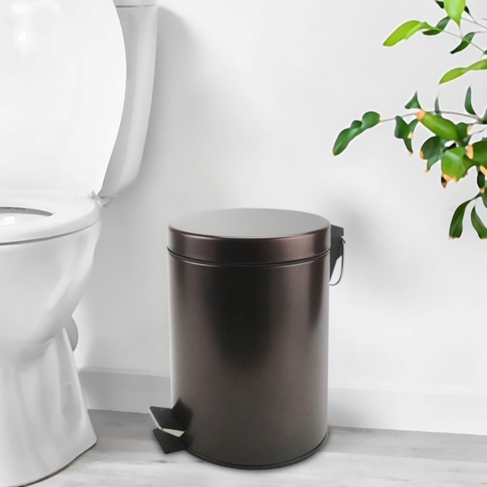 Zahari Home stainless steel trash can with bronze lid for clean corners.