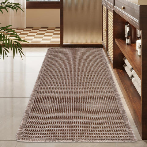 ZALL brown-tan bath mat protects floors and keeps feet warm.