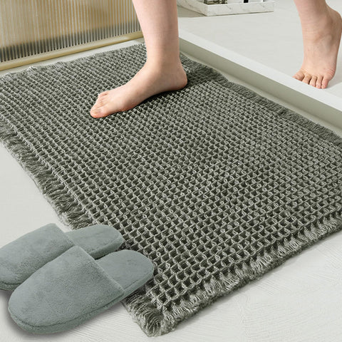 ZALL waffle bath mat front view in dark green, offering plush comfort and rapid water absorption