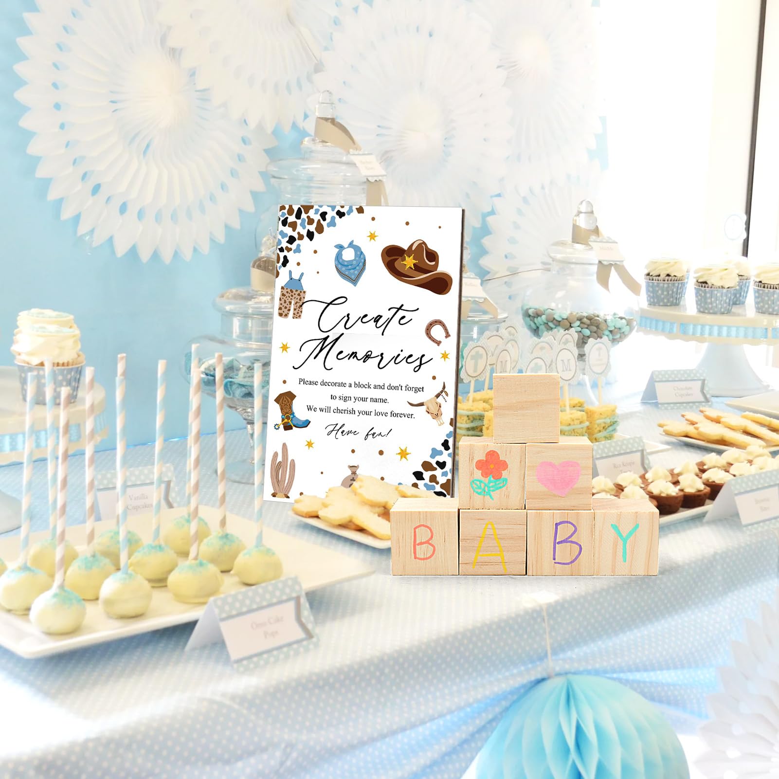 ZCPTZ baby shower gender reveal setup with cowboy charm and fun games.