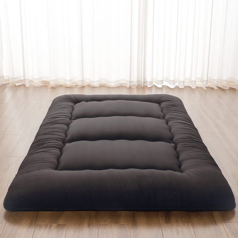 Zelladorra Japanese Floor Mattress folded in storage bag for easy transport