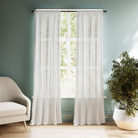Zenna Home bronze finish with round finials enhances room decor.