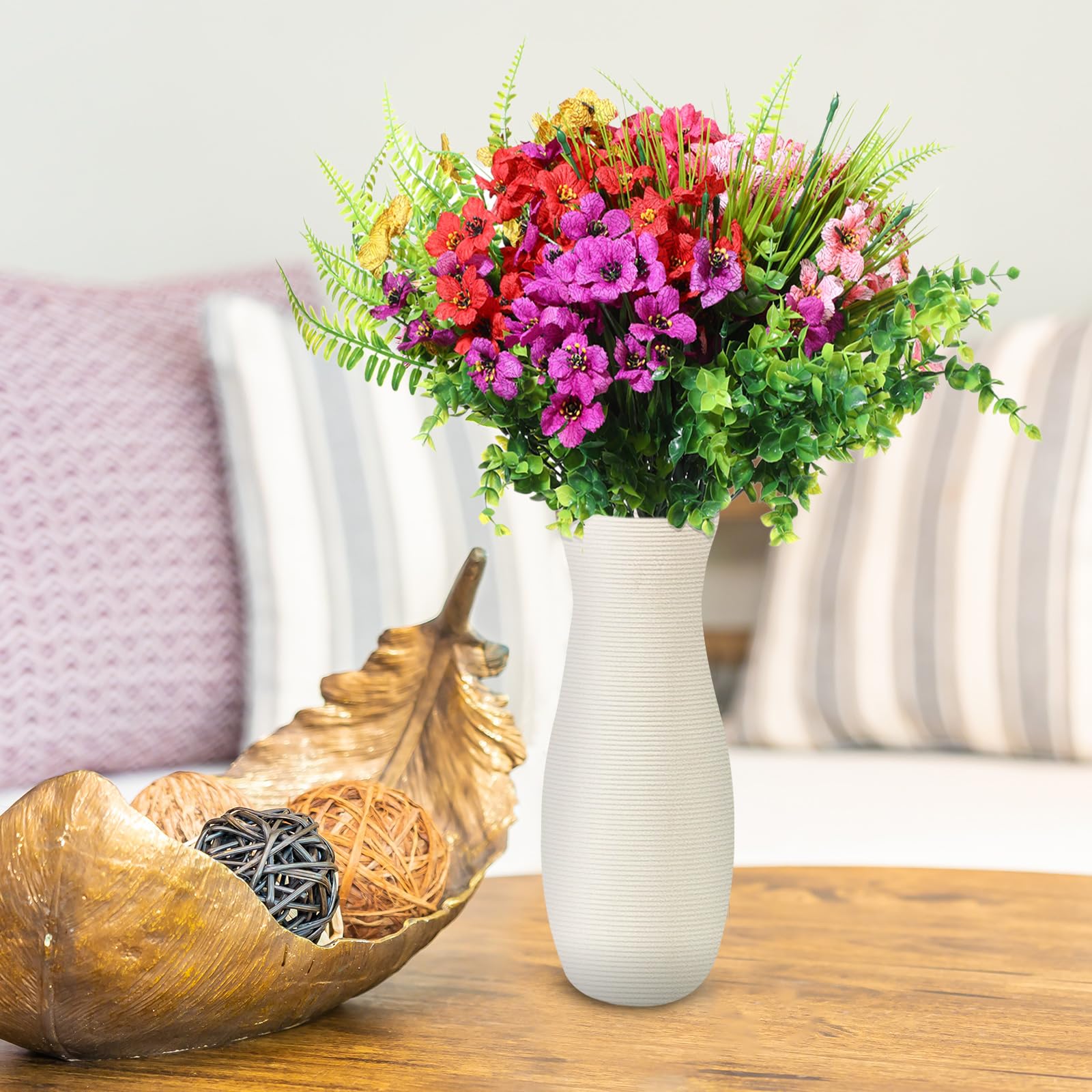 Zeyune multi-color faux flowers suit patios, gardens, and windowsills.