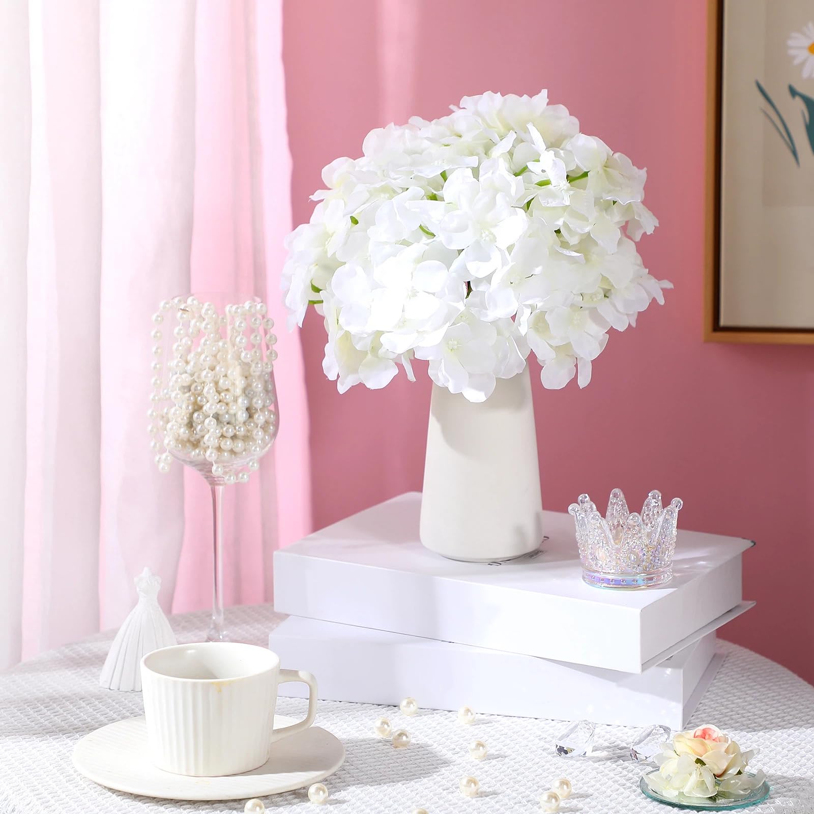 Zeyune white hydrangea arrangement creates timeless wedding decor.