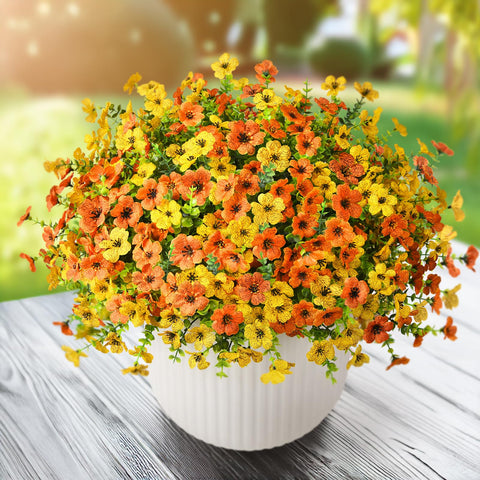 ZFProcess UV-resistant silk and plastic plants endure sun on balconies and decks.