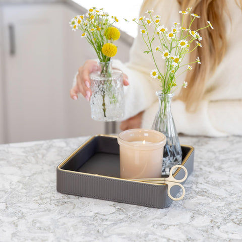 ZHEM leather catchall tray in black finish adding subtle elegance to a desk.