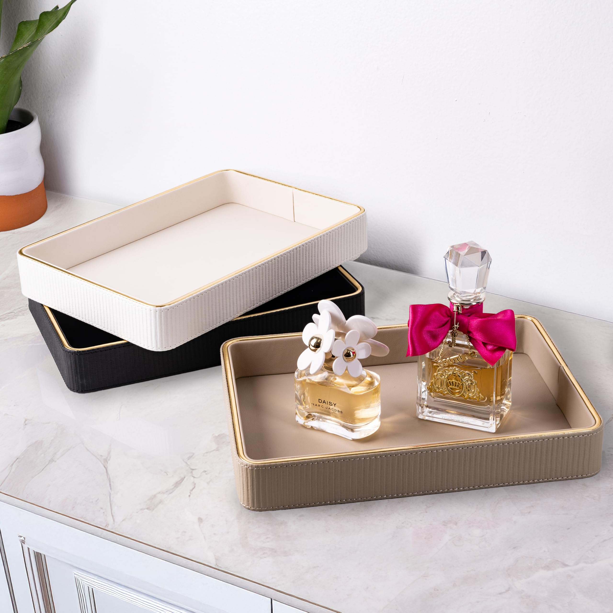 ZHEM leather catchall tray side angle highlighting raised edge and durable leather.