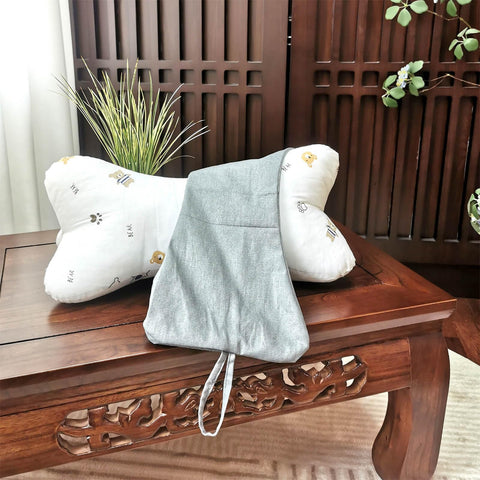 ZHIWEIKJ neck bone pillow shows loops at each end for versatile placement.