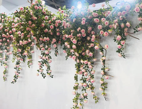 Zhixinyue dining table centerpiece rose garland enhances table settings.