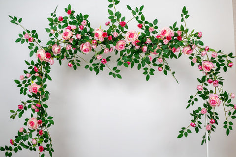 Zhixinyue rose garland ideal for wedding arches and stairways.