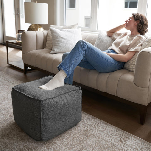Premium boucle texture adds tactile luxury to everyday relaxation.
