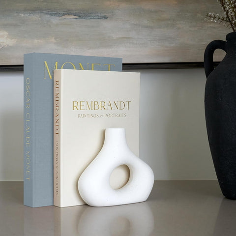 ZICOTO hollow decorative books offer hidden storage for notes and jewelry.