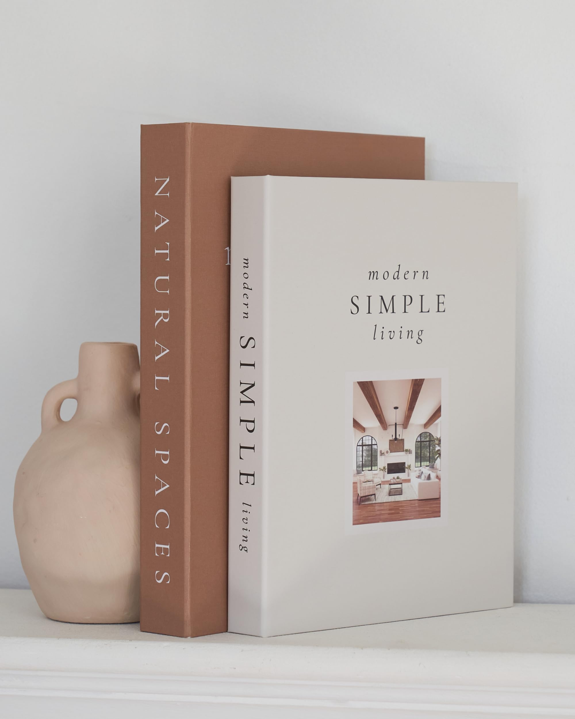 ZICOTO decorative books enhancing living space ambiance with tasteful color pairing.