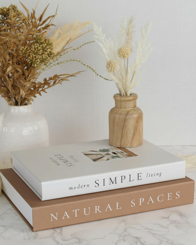 ZICOTO decorative books elevating mantel decor with timeless elegance.