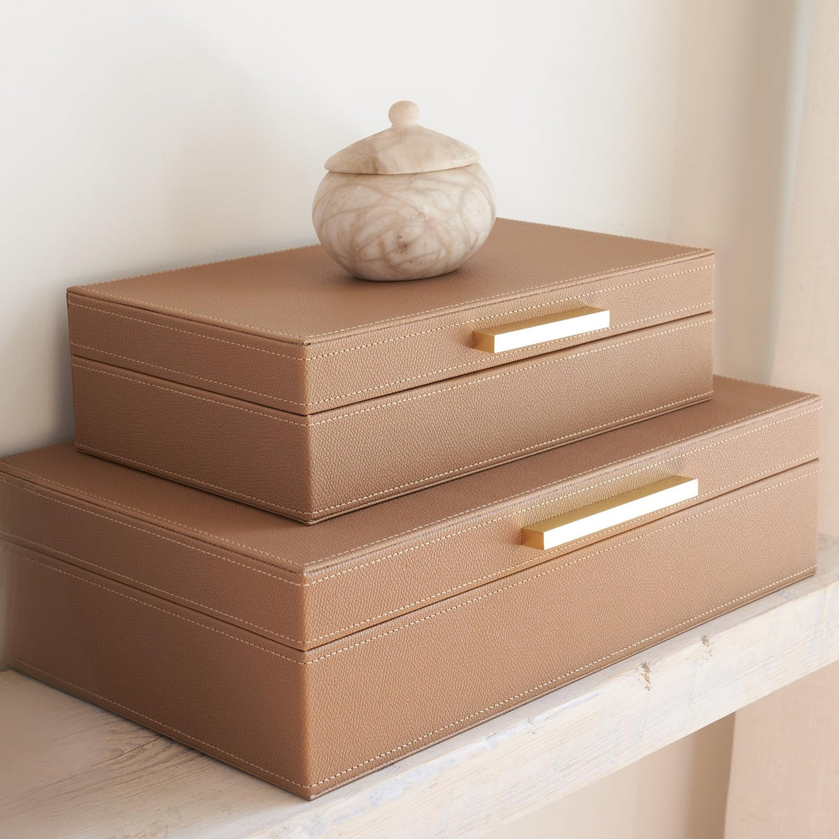 ZICOTO decorative storage boxes with lids on a shelf keep photos organized in style.