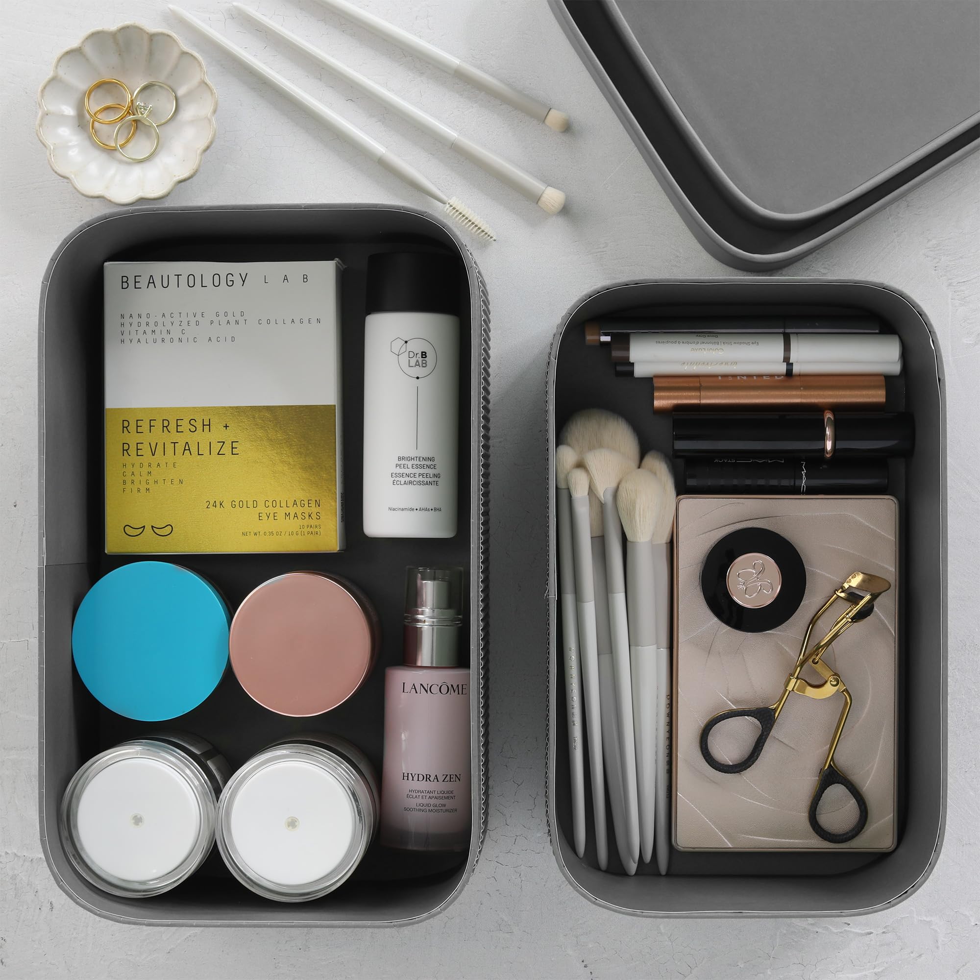 Two ZICOTO boxes on a desk, versatile storage to reduce clutter.