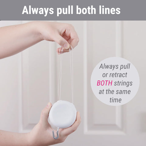Zip 'n Hang on glass panel demonstrates secure, clean display