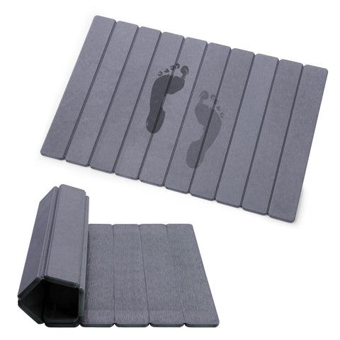 Zmnklry foldable stone bath mat rolled for compact storage.