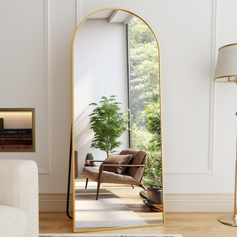 ZMYCZ arch full-length gold mirror in a cozy bedroom setup.