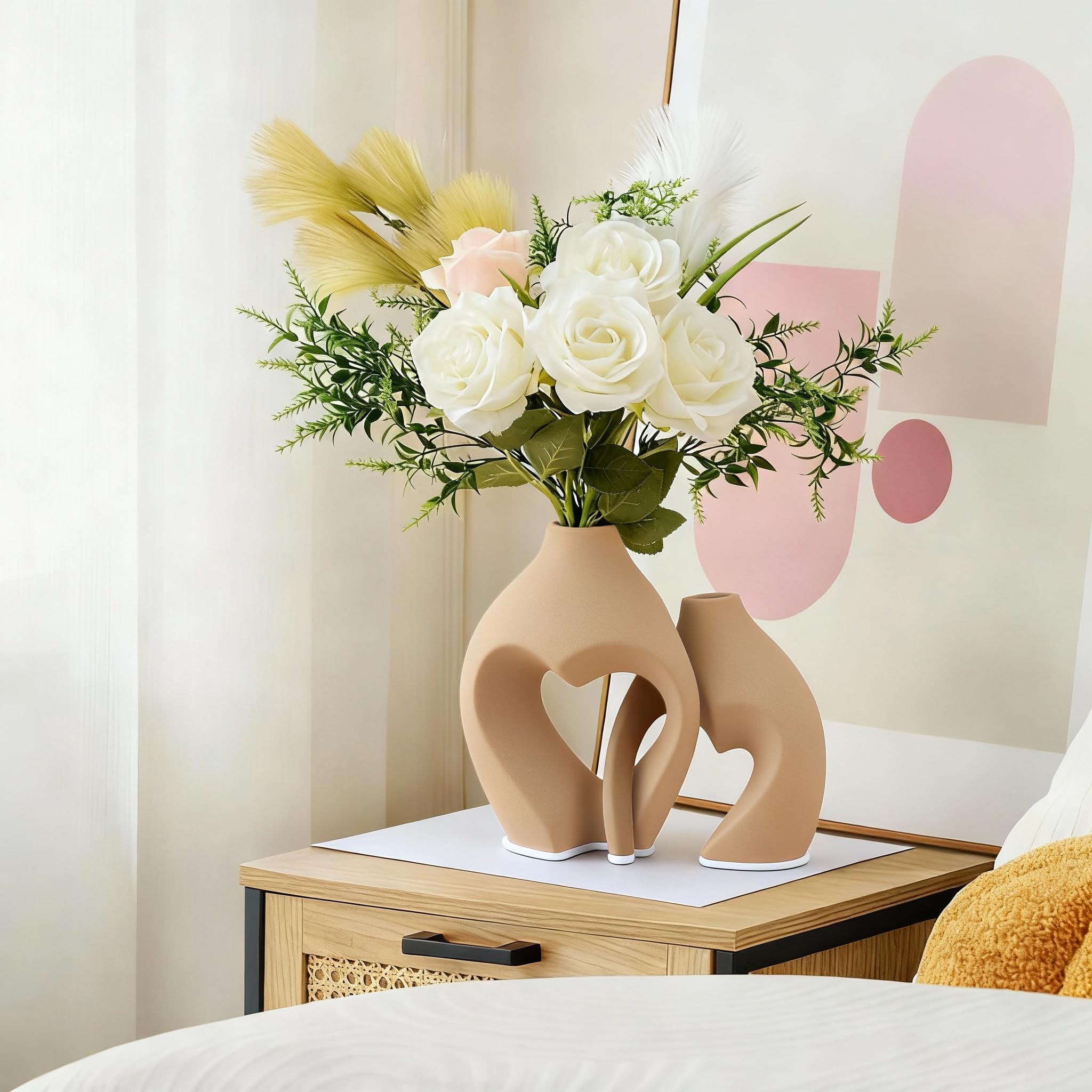 Zormon heart vases on a dining table setup with greenery
