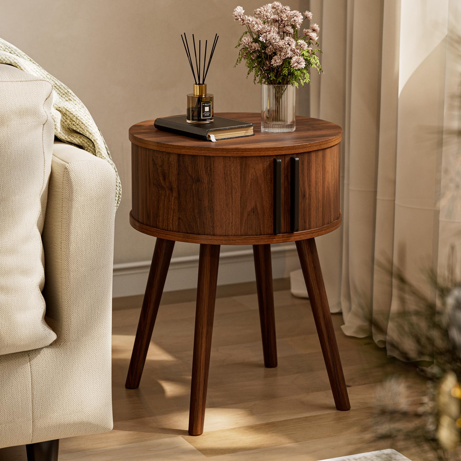 ZttRiee side table with sliding door offering discreet storage.