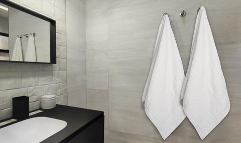 ZUPERIA economy cotton white towel, soft after multiple washes.